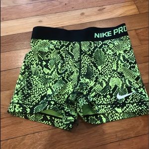 Women’s neon snakeskin Nike Pro shorts